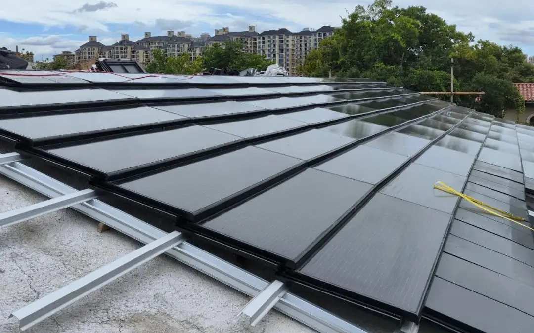 Photos show the installation process of solar roof tiles in a home, illustrating how the tiles are laid.